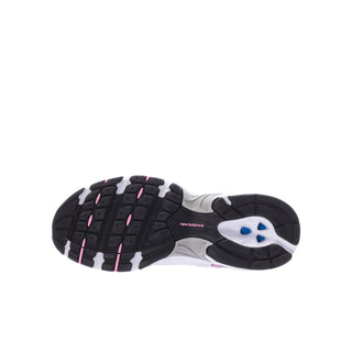 Youth sneakers outsole view with white, dark and pink accents, new balance logo