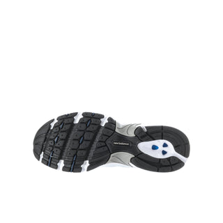 Youth sneaker outsole view, textured rubber tread with blue logo detail