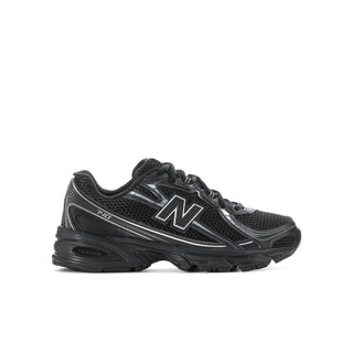 Youth New Balance running shoes, black mesh with silver N logo and lace-up design