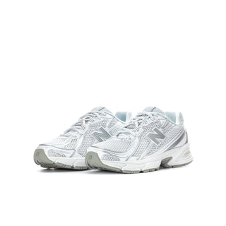 Youth running shoes, white and silver metallic, angled side view with lace panel