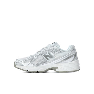 Youth running shoes, white and silver metallic, front side profile with textured upper
