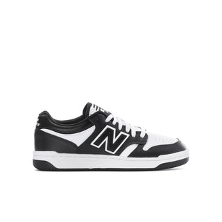 Youth black/white low-top sneaker with New Balance N logo and white midsole