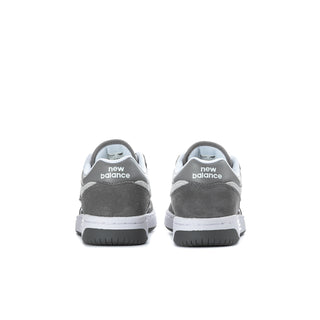 Youth sneakers, dark gray upper with white midsoles and 'new balance' heel text
