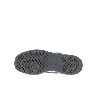Youth sneaker outsole with textured dark gray rubber tread