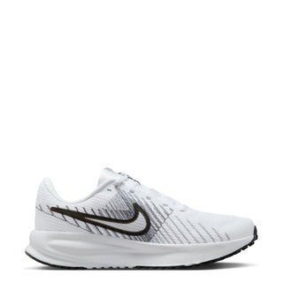 Women's running shoe side view in white with black Swoosh and sculpted midsole