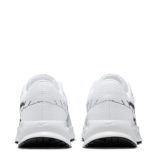 Women's running shoes rear view with white knit fabric and black outsole detail