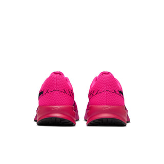 Women's pink running shoe heels with black detailing and cushioned rubber sole