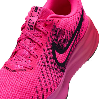 Women's pink knit running shoe upper with black Swoosh and lace details