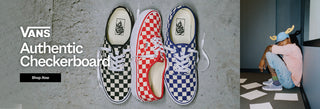 Three Vans sneakers in checkered pattern on a concrete floor with promotional text.