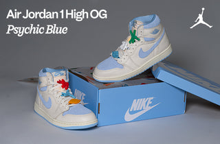 Air Jordan 1 High OG Psychic Blue sneakers with a Nike box on a gray background