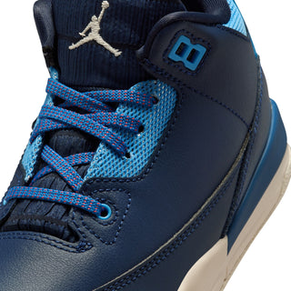 Kids high-top sneaker upper close-up with blue mesh, black overlays, red laces