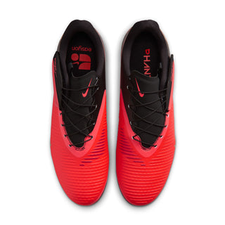 Pair of men's FG soccer cleats, bright red with black tongue and lace-up front