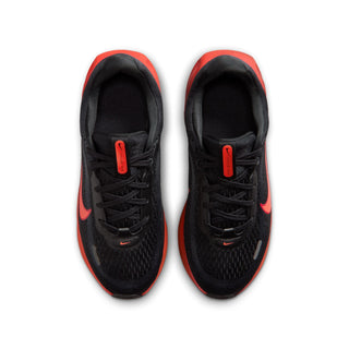 Pair of black youth running shoes viewed from above, with red trim and lace-up fronts.