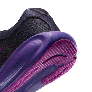 Close-up of youth running shoe heel and purple outsole with ribbed tread
