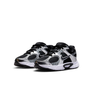 Nike youth running shoes with black laces, silver overlays, and white cushioned sole