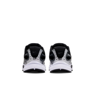 Nike youth sneakers from the back with black heel collar and white midsole