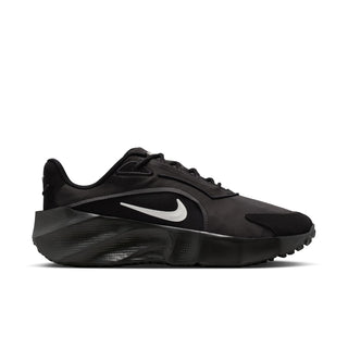 Black womens running shoe with Nike swoosh and lace-up front, cushioned tread sole
