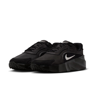 Black womens running shoe, side view with Nike swoosh and textured midsole