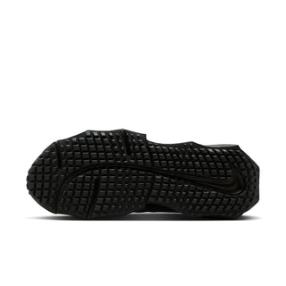 Black womens shoe outsole with textured traction pattern