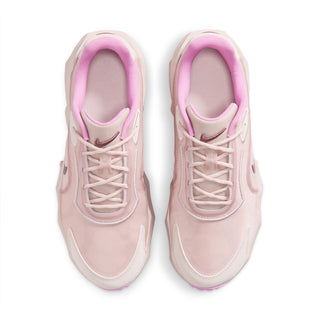 Pair of light pink women’s running sneakers with pink-lined collars and lace-up tops