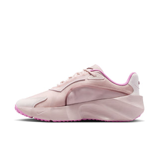 Light pink women’s running sneakers side view with purple trim and Nike swoosh