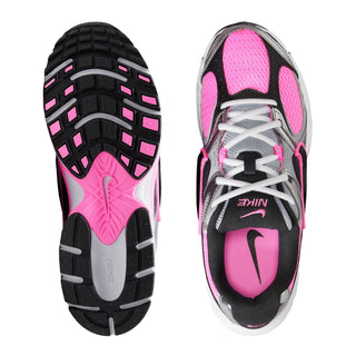 Women's running sneakers outsole and side profile, black sole with pink traction tread.