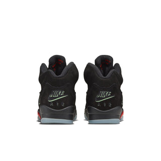 Black youth Air Jordan 5 sneakers with Nike Air heel text and red accent details