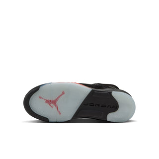 Black rubber outsole with JORDAN text and red Jumpman on the heel