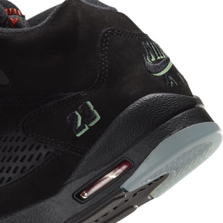Black youth Air Jordan 5 sneaker close-up, visible Air unit and side panel details