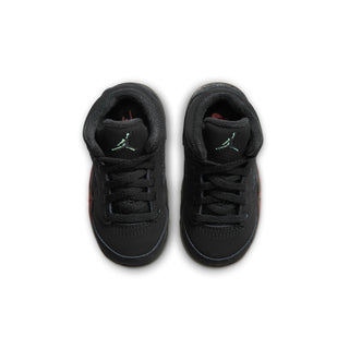 Black toddler sneakers viewed from above with lace-up closure and padded tongue