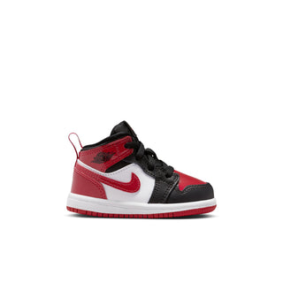 Kids mid-top sneakers in black, varsity red, and white with lace-up design