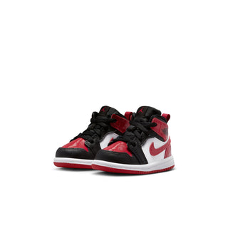 Kids mid-top sneakers pair in black, red, and white with black laces and red accents