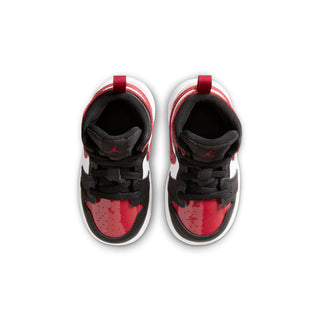 Kids mid-top sneakers top view showing black laces and red toe panels