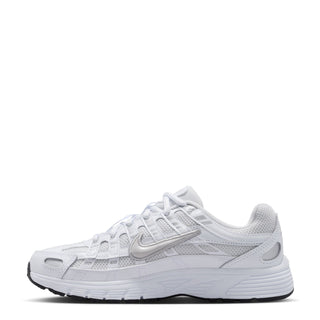 Youth white running shoe with Nike-style swoosh, lace closure, and cushioned sole