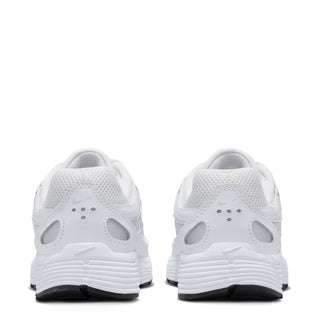 Youth white sneakers rear view with cushioned collar and supportive heel cup