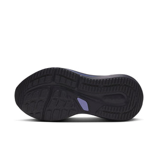Women’s black rubber outsole with textured tread and purple accent logo