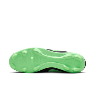 Neon green outsole of black soccer cleats with molded studs, FG/MG traction
