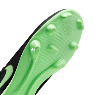 Neon green outsole view of black soccer cleats with stud pattern for traction