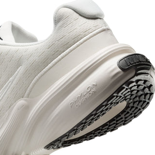 Women's running shoe close-up, side wall and outsole tread with Nike heel detail