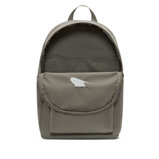 Nike Brasilia Heritage backpack with top opening, rounded flap, and white logo patch