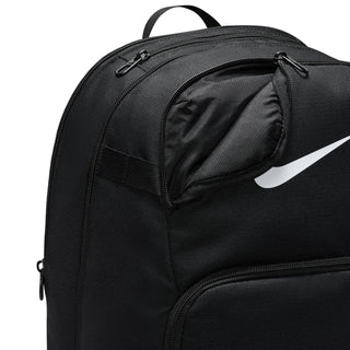 Nike Brasilia backpack close-up of top and front zippers with black interior lining.