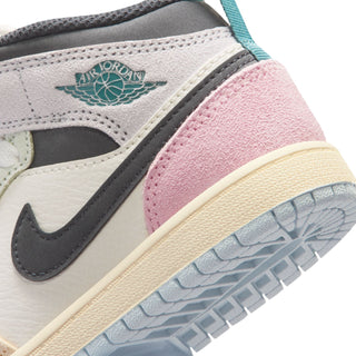 Kids Air Jordan 1 mid-top sneakers, Air Jordan branding with pink sidewall and blue tread.