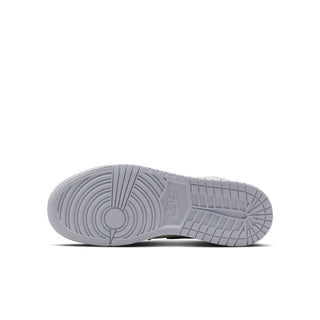 Air Jordan 1 Mid youth outsole view, textured tread on light gray rubber