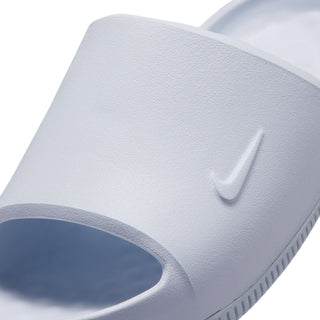 Close-up of women’s light gray slide sandal upper with swoosh logo