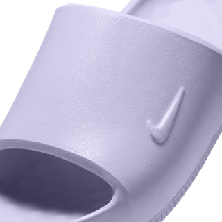 Close-up of women’s pale purple shimmer slide upper with Nike Swoosh and strap