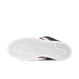 Black sneaker outsole with white rubber tread and pink stripe edge detail.