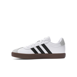 Youth adidas sneakers, side profile with white upper, black stripes, gum midsole