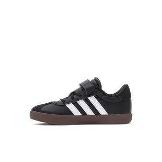 Kids black sneakers with hook-and-loop strap, white stripes, and brown rubber sole