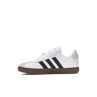 Kids white court sneakers with black stripes and gum outsole, side profile
