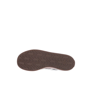 Kids sneaker outsole with brown tread pattern